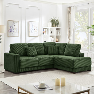 Canapé d'angle en L de 236 cm avec méridienne réversible, revêtement en velours côtelé doux, 3 places, structure stable en bois massif et grande durabilité, idéal pour un salon d'appartement.