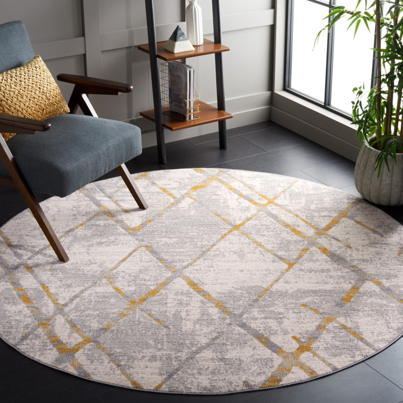 Ramm Geometric Machine Woven Polyester Area Rug in Gray/Gold, Round 6'7"