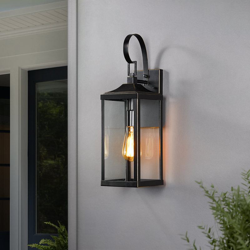 Gaudencia 19.3'' H Outdoor Wall Lantern, Black with Bronze Highlights