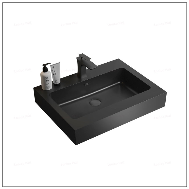 Élégant lavabo en quartz noir mat avec trop-plein intégré, durable et facile à nettoyer pour les salles de bain modernes.