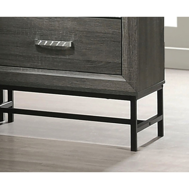 Commode de style contemporain à 4 tiroirs avec pieds en métal et poignées décoratives en acrylique