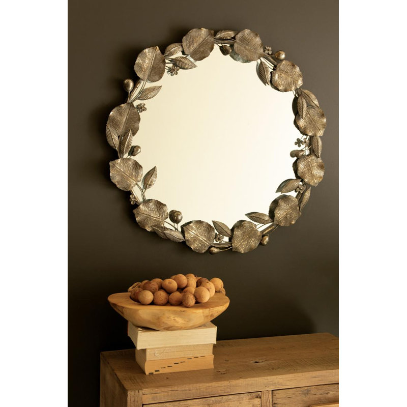 ROUND RUSTIC FRAMED MIRROR WITH LEAF DETAIL