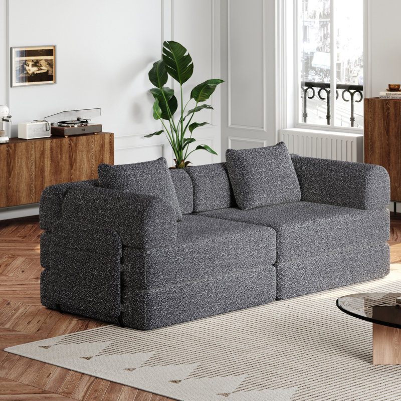 Canapé-lit convertible avec poches et coussins de rangement latéraux, idéal pour les salons, les chambres à coucher et les bureaux, confortable et pliable
