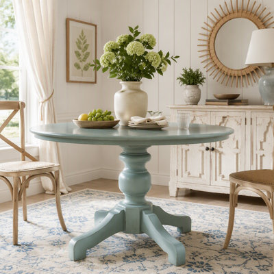 Table de salle à manger ronde à deux tons avec pieds sculptés
