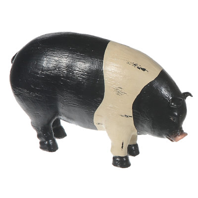 Sculpture de cochon noir et blanc