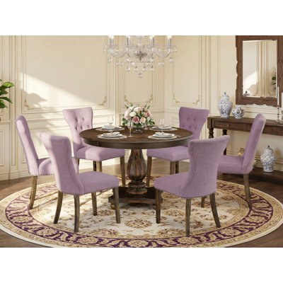 Ensemble de table et chaises de cuisine 7 pièces comprenant une table de salle à manger ronde avec piédestal et 6 chaises rembourrées en tissu Dahlia