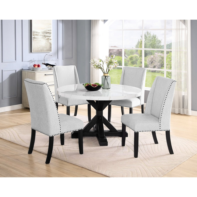 Table de salle à manger élégante avec plateau en faux marbre blanc, pieds noirs, ronde, pouvant accueillir 4 personnes avec un look moderne et robuste,