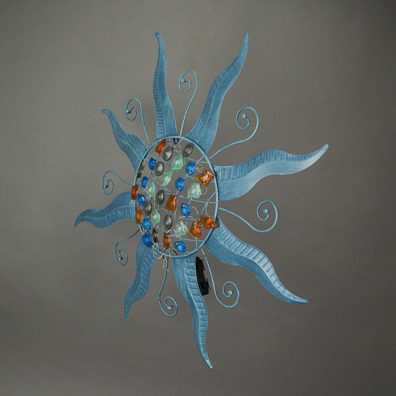 Décoration murale soleil en métal