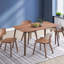 Ensemble de salle à manger 5 pièces Casson avec table rectangulaire et fauteuils confortables, parfaits pour les espaces de salle à manger modernes et élégants