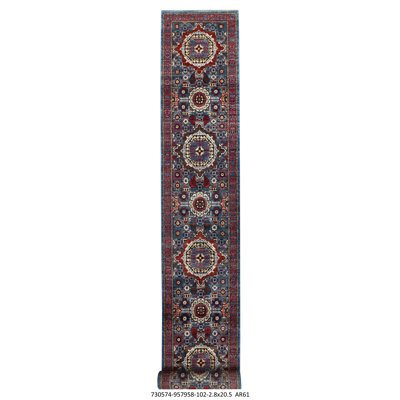 Tapis oriental en laine noué à la main bleu clair / ivoire / rouge