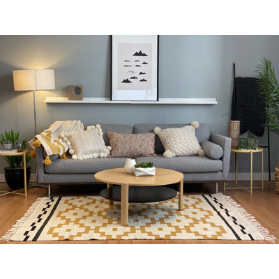 Tapis jaune à médaillons
