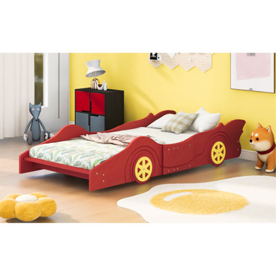 Lit simple en forme de voiture de course avec des roues rouges et une fabrication de qualité, assurant la satisfaction des rails solides, offrant un confort maximal