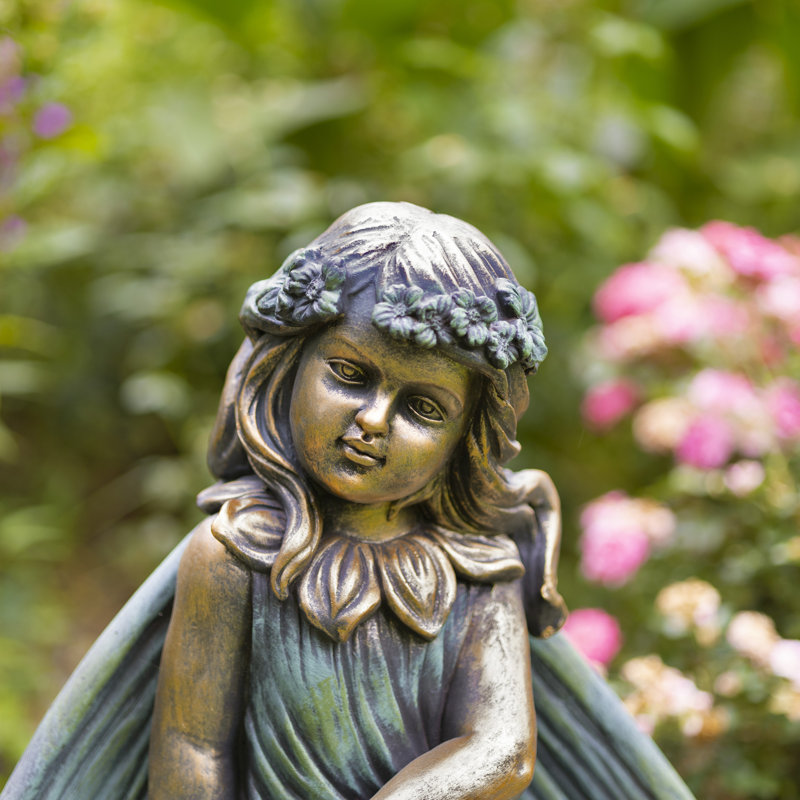 Statue de jardin fée en magnésium assise