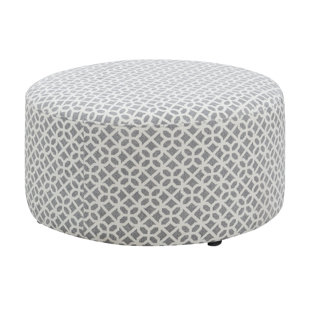 Round Ottoman With Clean Lines And Welt Trim