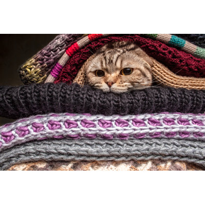 Pile Of Woolen Clothes - Wrapped Canvas Print
