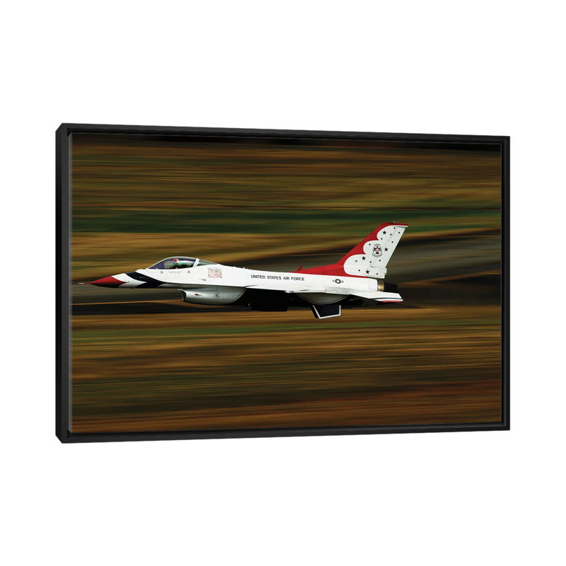 An F-16 Thunderbird Of The US Air Force Flying At High Speed by Stocktrek Images - Gallery-Wrapped Canvas Giclée, No Mat