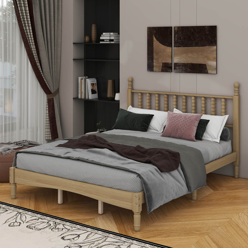 Grand lit plateforme en bois avec tête de lit en forme de gourde