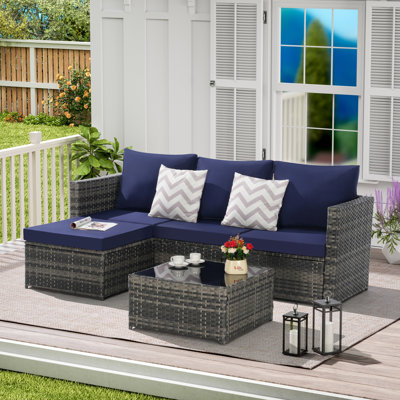 Ensemble de mobilier d'extérieur en L tissé durable avec repose-pieds et table de détente détachable, idéal pour la détente dans la cour et la piscine