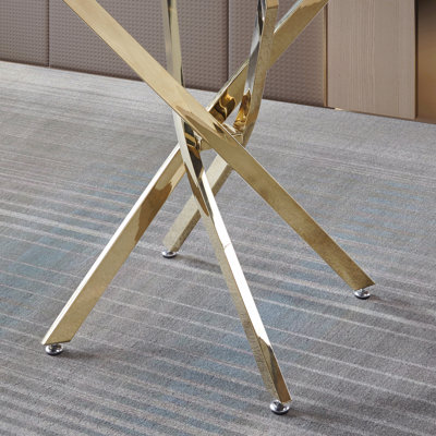 Table de salle à manger ronde contemporaine avec plateau en verre trempé transparent et pieds en acier inoxydable doré