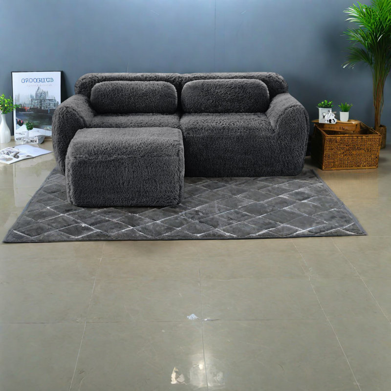 Canapé ergonomique confortable, tissu gris foncé moelleux, idéal pour les chambres à coucher