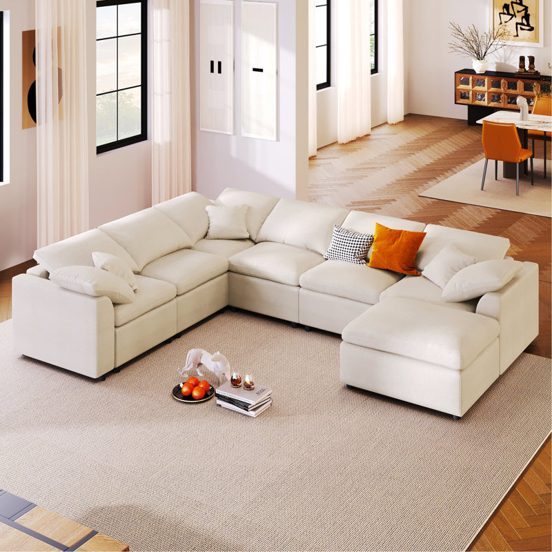 Canapé modulaire 7 places avec repose-pieds mobile