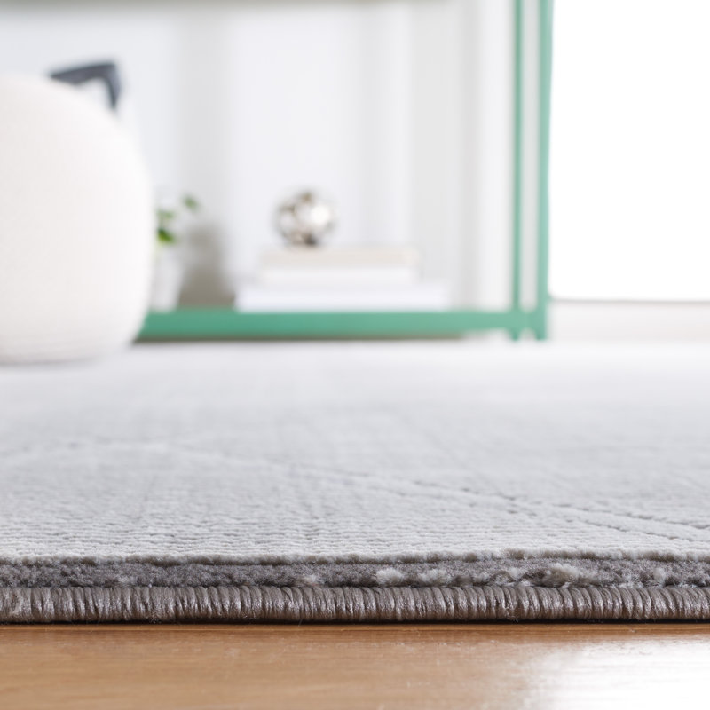 Tapis gris en polyester tissé à la main Iarla, Rectangle 5 pi 3 po x 7 pi 7 po