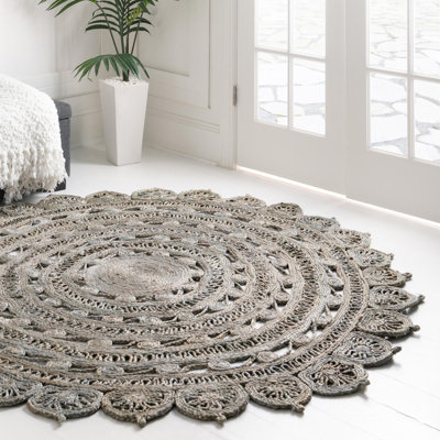 Tapis gris ovale en jute tissé à la machine