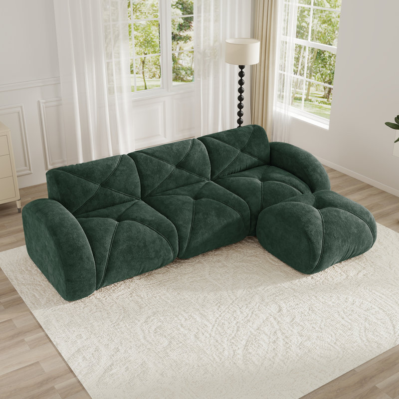 Canapé en forme de L en velours doux désossé, mousse 32D haute densité, base sans assemblage, conception antidérapante, repose-pieds mobile convenant aux salons.