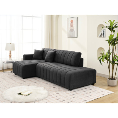 En forme de L d'inspiration scandinave, couleur principale gris foncé, rembourrage en mousse à 3 sièges, méridienne réversible pour coin de vie compact inspiré des espaces, laine, sophistication capitonnée, conception modulaire