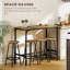 Ensemble de table de bar 5 pièces, hauteur de comptoir, plateau en bois brun rustique, structure en métal noir, 4 tabourets de bar. Ensemble de repas/pub gain d'espace idéal pour une petite cuisine, un appartement ou un coin repas.