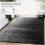 Tapis rayé en laine touffeté à la main noir / gris Brittanie-28199812