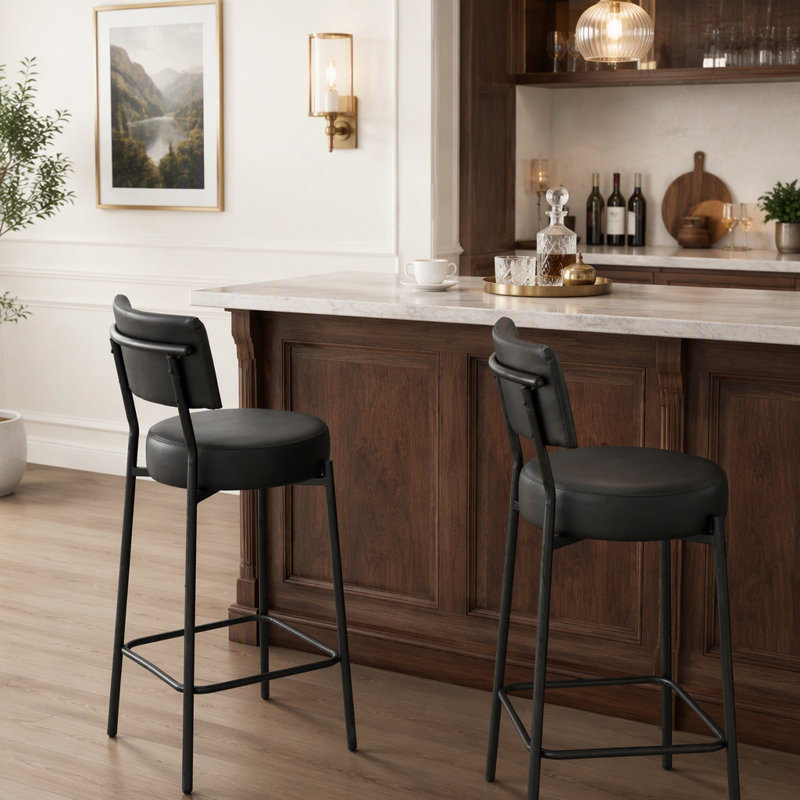 Ensemble de 2 tabourets contemporains en cuir noir avec dossier incurvé et structure en métal robuste pour une assise confortable