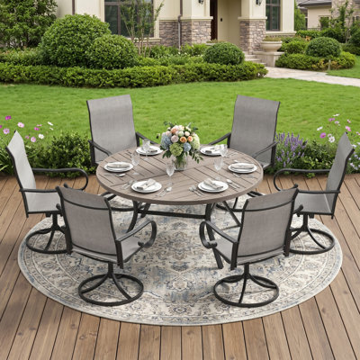 Holmstrom 6-Person Round Patio Dining Set With 360° Swivel PVC-Coated Polyester Chairs