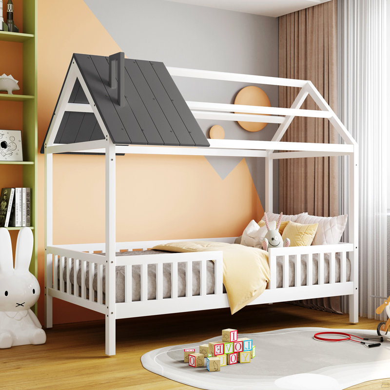 Lit simple en bois avec clôture