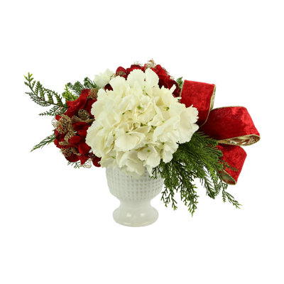Floral des Fêtes avec hortensias, conifère et arcs