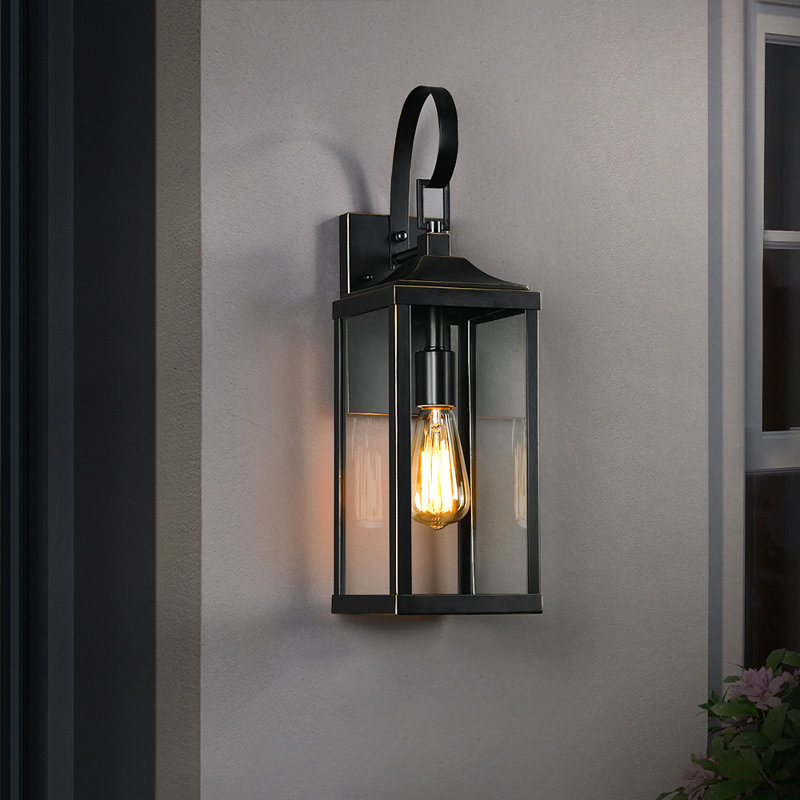 Gaudencia 19.3'' H Outdoor Wall Lantern, Black with Bronze Highlights