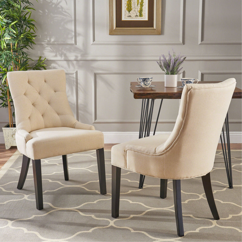 Chaise de salle à manger contemporaine avec piqûres en losange touffetées sans boutons et pieds fuselés