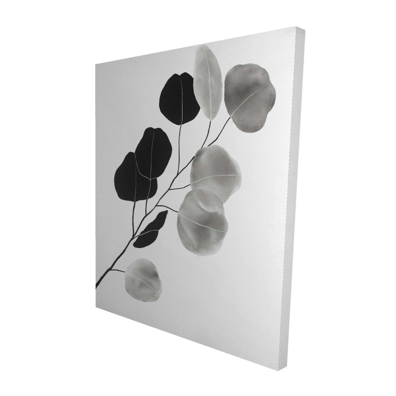 Branche en niveaux de gris avec des feuilles de forme ronde - décor de toile blanche