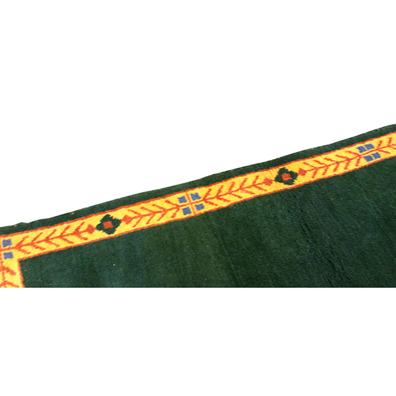 Tapis vert noué à la main de haute qualité