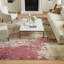 Tapis ivoire / rose à motif abstrait Adrieonna-592528140