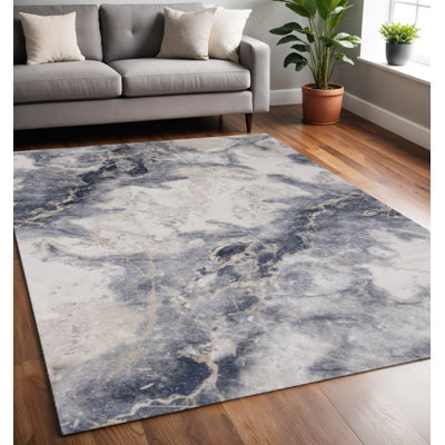 Tapis abstrait bleu crème et gris 5 pi x 8 pi