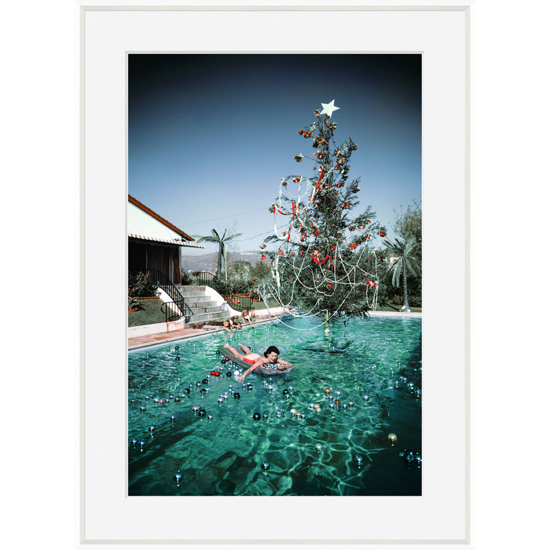 Christmas Swim Print by Slim Aarons, Black Framed Paper, 50.75"H x 35.75"W x 2.375"D