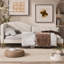 Lit de jour simple rembourré avec tête de lit et accoudoirs, pieds de soutien, beige