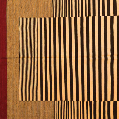 Tapis orange / noir en chenille / polyester tissé à la machine Smitty