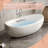 57.09"x33.46"Acrylic One-piece Seamless Freestanding Bathtub with Armrests