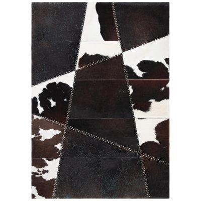 Tapis brun foncé en cuir tissé à la main et à plat