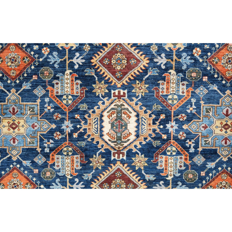 Hand Knotted Wool Area Rug in Navy And Rust
