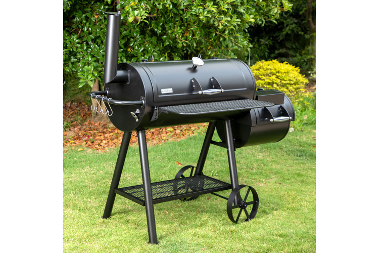 offset smoker sitting on grass