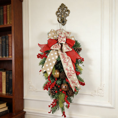 Festive Teardrop Christmas Wreath Adorned with Red Berries, Jingle Bells, Pinecones, and Embroidered "Let it Snow" Burlap Bow - Perfect Holiday Door Hanger