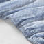 Édredon et drap bleu floral
